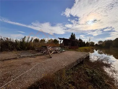 OPORTUNITATE, 11000 mp teren intravilan, cu diverse constructii pe el, Seini la DN - foto 9