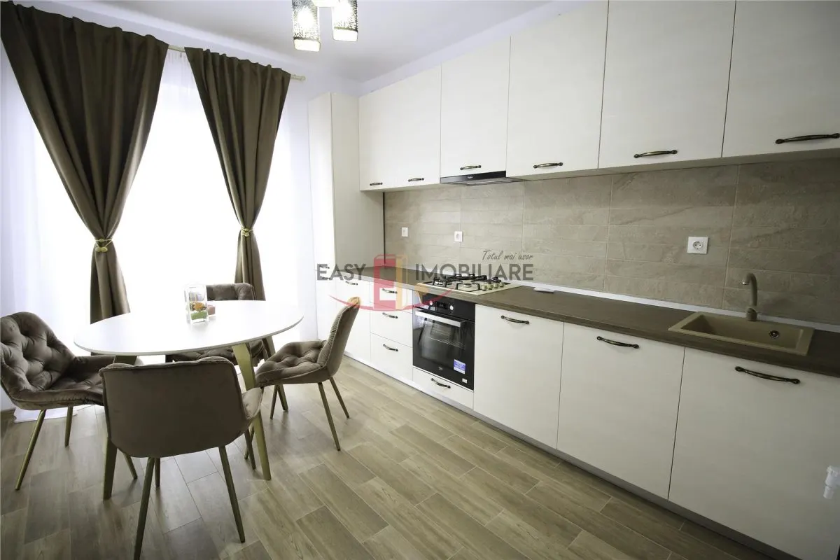Apartament 2 camere, etaj 1, amenajat lux, loc de parcare - foto 4