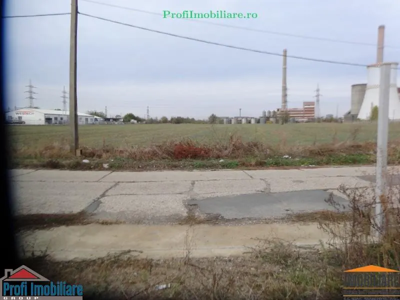 Teren 5.000 mp pentru diverse activitati cu acces din sosea strada Ovidiu in fata la CET Arad - foto 6