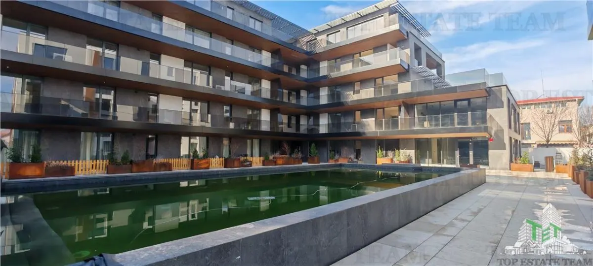 Apartament de 4 camere, cu finisaje premium, 160mp, 2bai, 2 bucatarii, toate utilitatile, piscina, complex rezidential securizat, zona Padurea Baneasa - foto 1